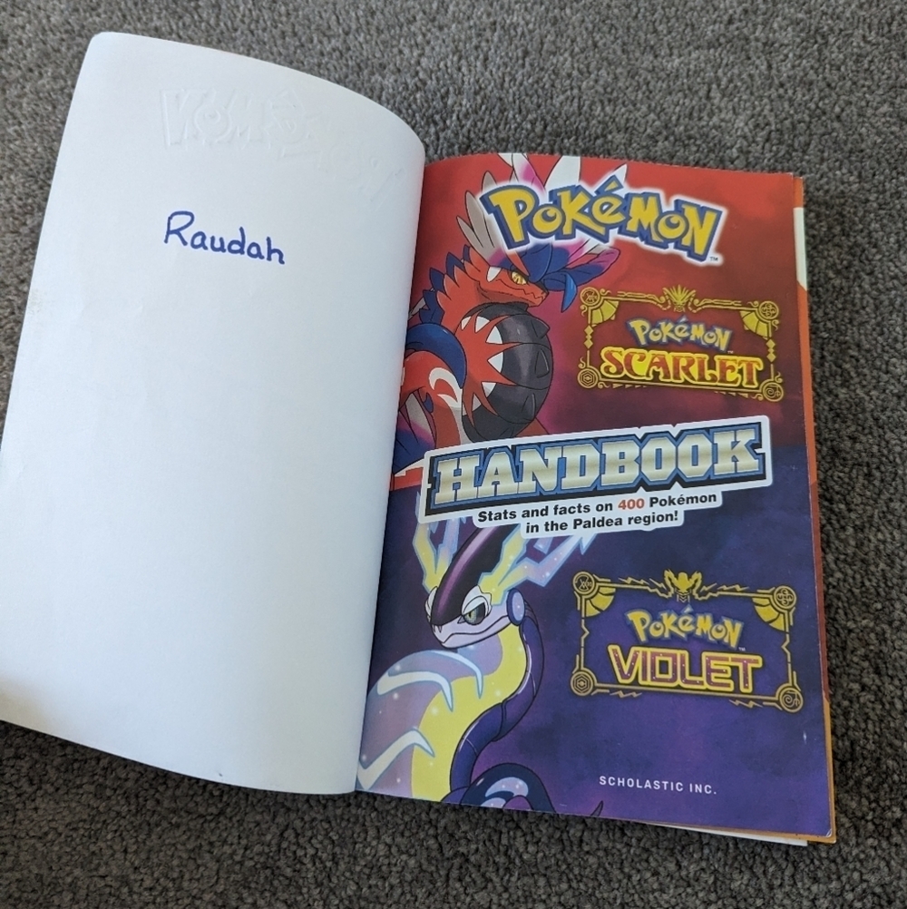 Scarlet & Violet Handbook (Pokémon) (Pokémon) Paperback –2023 by Scholastic - Picture 3 of 5